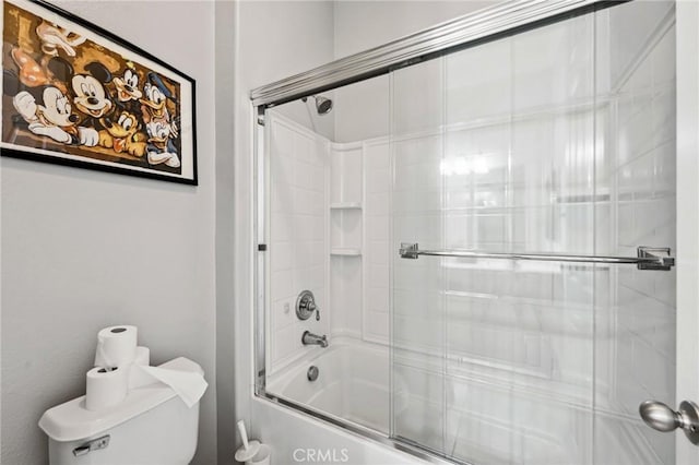 10237 Cotoneaster St, Apple Valley, CA 92308 - bathroom featuring toilet and enclosed tub / shower combo