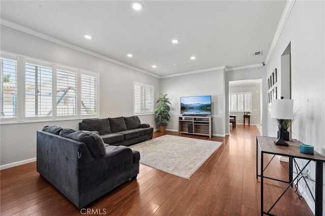 10237 Cotoneaster St, Apple Valley, CA 92308 - living area featuring crown molding, recessed lighting, dark wood-style floors, and baseboards