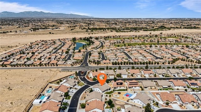 10237 Cotoneaster St, Apple Valley, CA 92308 - aerial overview of property's location with nearby suburban area and a mountain backdrop