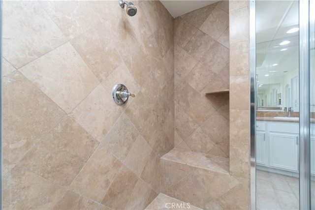 583 Ruth Cir, Corona, CA 92879 - bathroom with tiled shower, vanity, and recessed lighting