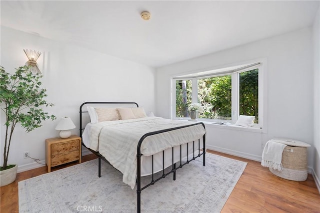 2704 Albatross Dr, Costa Mesa, CA 92626 - bedroom with baseboards and wood finished floors
