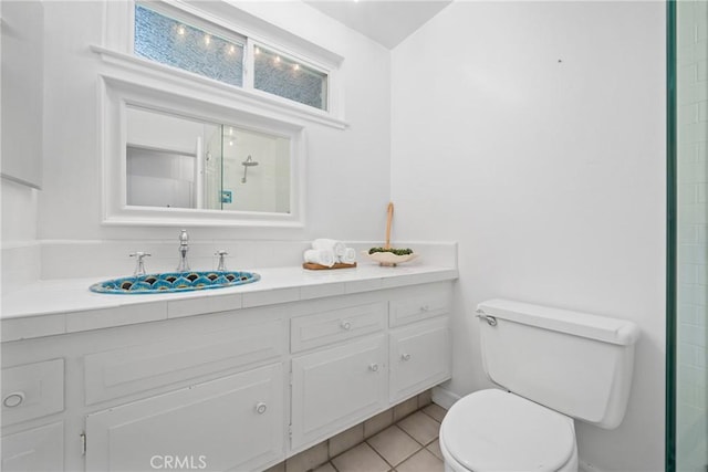 2704 Albatross Dr, Costa Mesa, CA 92626 - bathroom with toilet, vanity, and tile patterned floors