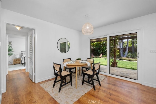 2704 Albatross Dr, Costa Mesa, CA 92626 - dining room with light wood-style floors and baseboards