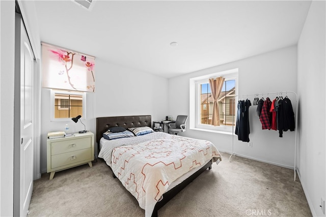 5874 Silver Oaks Dr, Chino, CA 91710 - bedroom with light colored carpet, multiple windows, and baseboards
