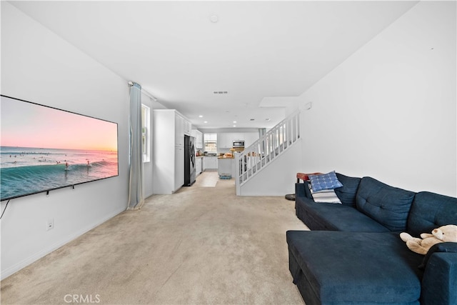 5874 Silver Oaks Dr, Chino, CA 91710 - living room with light carpet, stairs, and recessed lighting