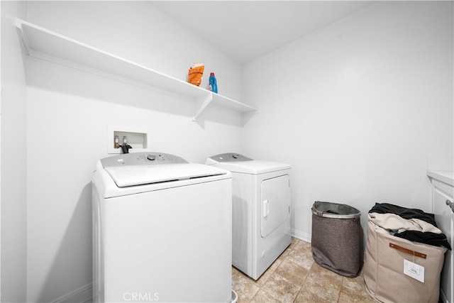 5874 Silver Oaks Dr, Chino, CA 91710 - washroom with independent washer and dryer and baseboards