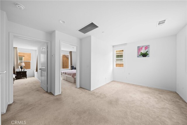 5874 Silver Oaks Dr, Chino, CA 91710 - unfurnished bedroom with carpet floors and multiple windows