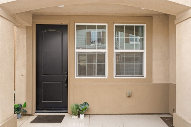 5874 Silver Oaks Dr, Chino, CA 91710 - property entrance with stucco siding