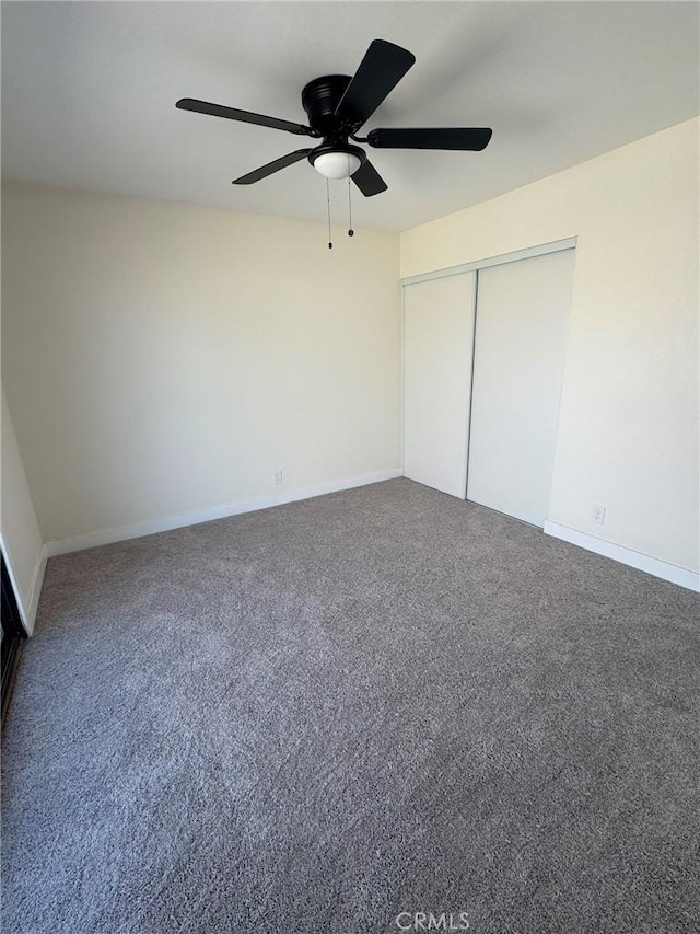 37146 Lombardy Ave, Barstow, CA 92311 - unfurnished bedroom featuring carpet floors, baseboards, a closet, and a ceiling fan