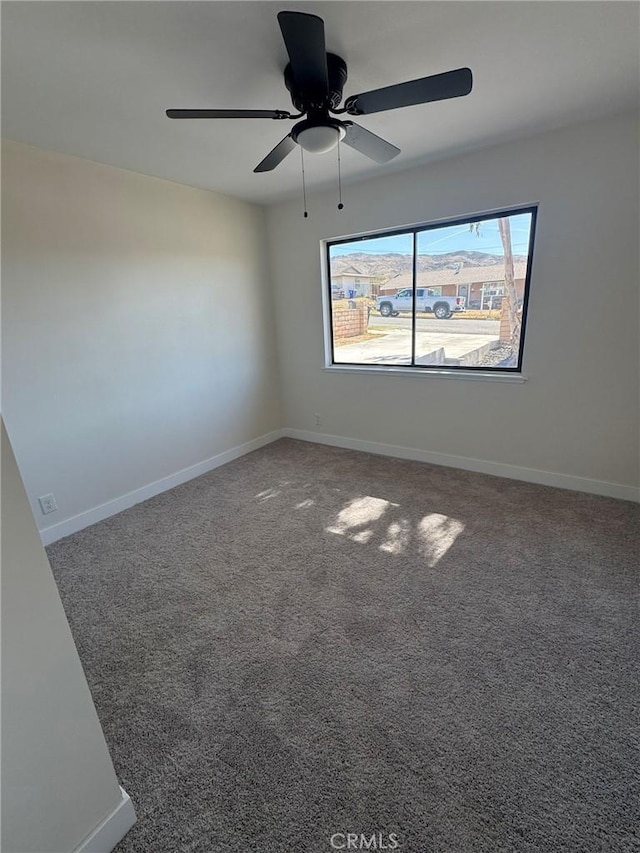 37146 Lombardy Ave, Barstow, CA 92311 - empty room with baseboards, carpet flooring, and ceiling fan