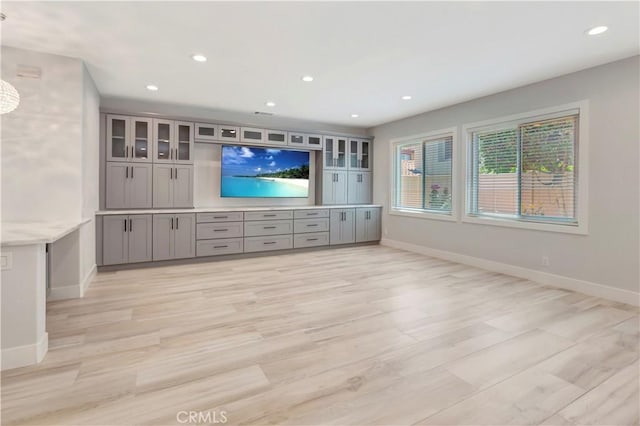26242 Via Corrizo, San Juan Capistrano, CA 92675 - unfurnished living room with baseboards, light wood-style floors, and recessed lighting