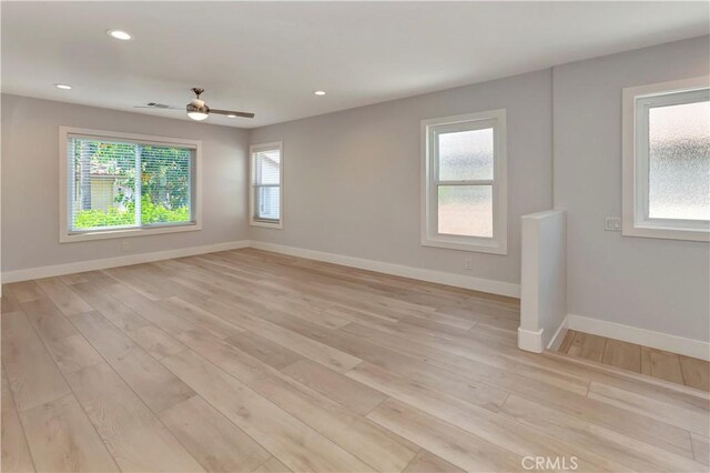 26242 Via Corrizo, San Juan Capistrano, CA 92675 - spare room featuring light wood-style flooring, baseboards, recessed lighting, and a ceiling fan