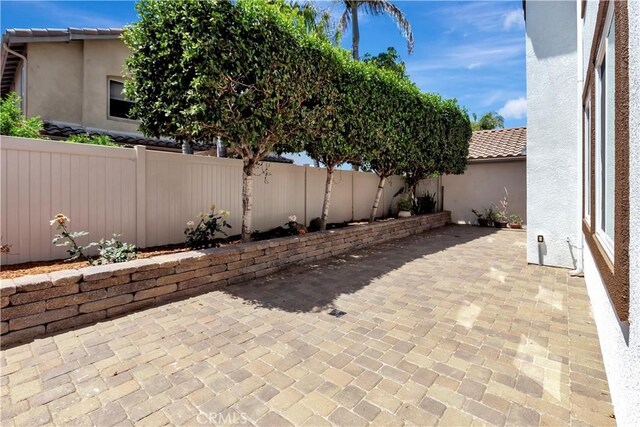 26242 Via Corrizo, San Juan Capistrano, CA 92675 - fenced backyard with a patio area