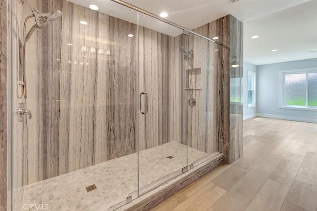 26242 Via Corrizo, San Juan Capistrano, CA 92675 - bathroom featuring a marble finish shower, recessed lighting, and wood finished floors