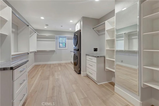 26242 Via Corrizo, San Juan Capistrano, CA 92675 - spacious closet featuring stacked washer / dryer and light wood finished floors