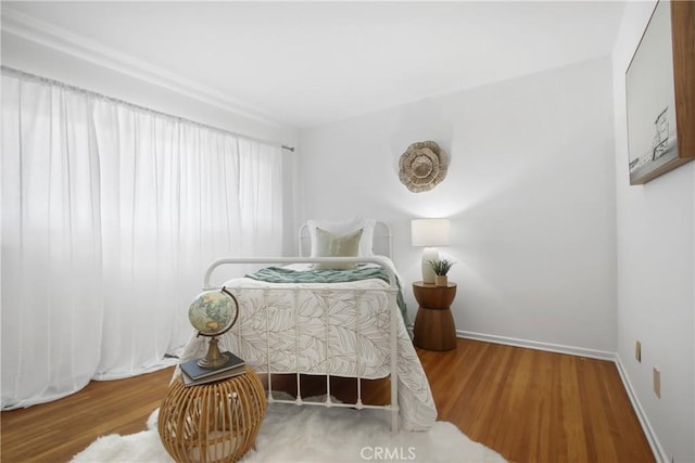 3441 Lilly Ave, Long Beach, CA 90808 - bedroom featuring wood finished floors and baseboards