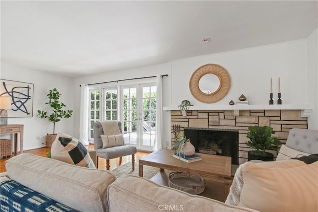 3441 Lilly Ave, Long Beach, CA 90808 - living area with wood finished floors, a fireplace, and baseboards