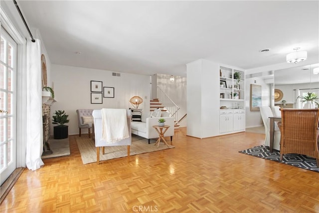 3441 Lilly Ave, Long Beach, CA 90808 - dining space with stairway and baseboards