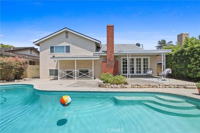 3441 Lilly Ave, Long Beach, CA 90808 - view of swimming pool with a patio area and french doors