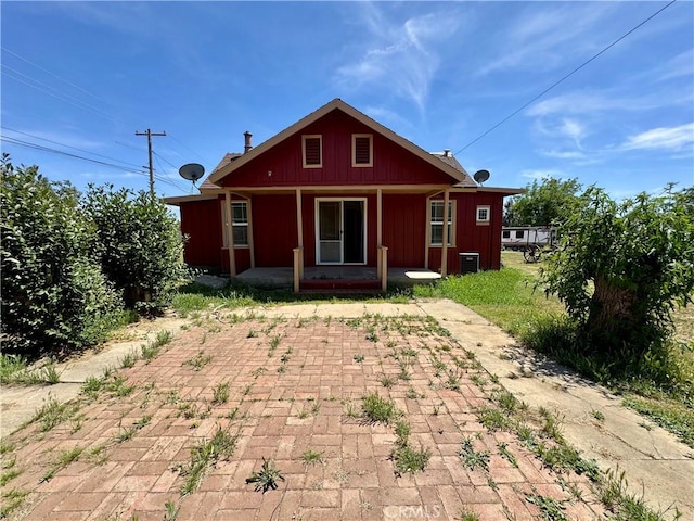 10265 Nancy Ave, Cherry Valley, CA 92223 - rear view of property with a porch and board and batten siding
