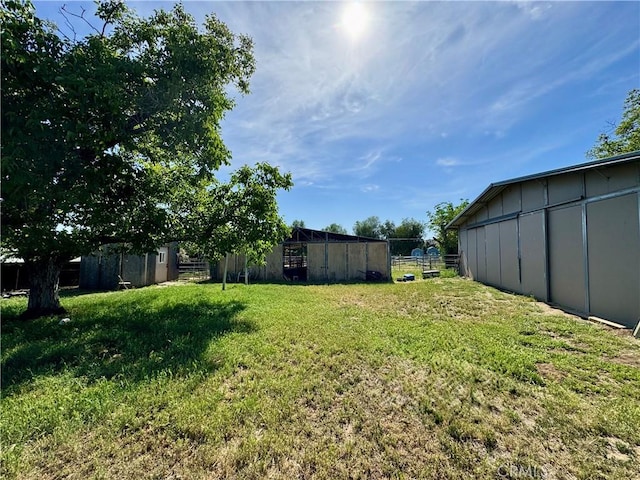10265 Nancy Ave, Cherry Valley, CA 92223 - view of yard featuring a pole building and an outbuilding