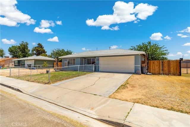 24438 Sage Ave, Boron, CA 93516 - single story home featuring a garage, driveway, and stucco siding