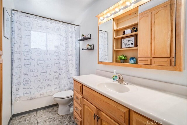 24438 Sage Ave, Boron, CA 93516 - bathroom with vanity, toilet, and shower / bath combo