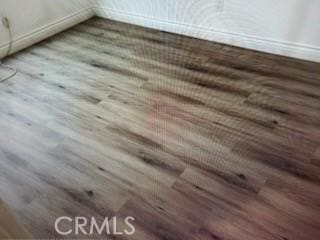 850 N Kathleen Ln, Orange, CA 92867 - detailed view of wood finished floors and baseboards