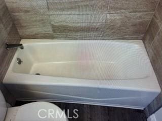 850 N Kathleen Ln, Orange, CA 92867 - bathroom with toilet and a tub