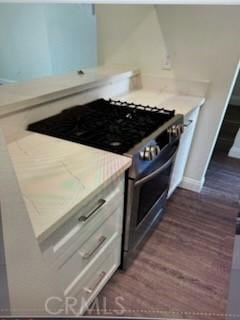 850 N Kathleen Ln, Orange, CA 92867 - kitchen featuring gas stove, dark wood finished floors, baseboards, light stone countertops, and white cabinetry