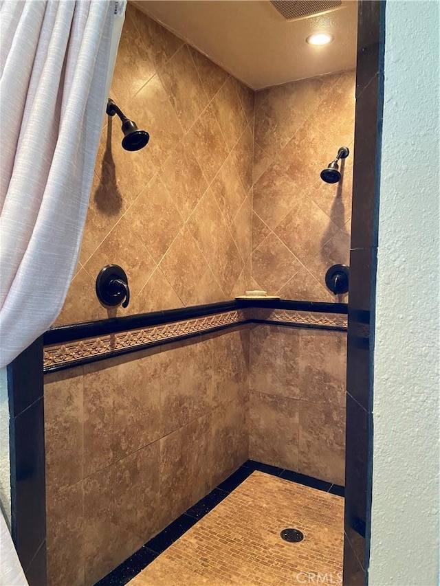 7614 Calpella Ave, Hesperia, CA 92345 - bathroom featuring tiled shower