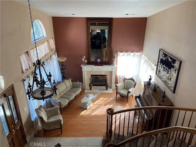 7614 Calpella Ave, Hesperia, CA 92345 - living room with a tiled fireplace and tile patterned flooring