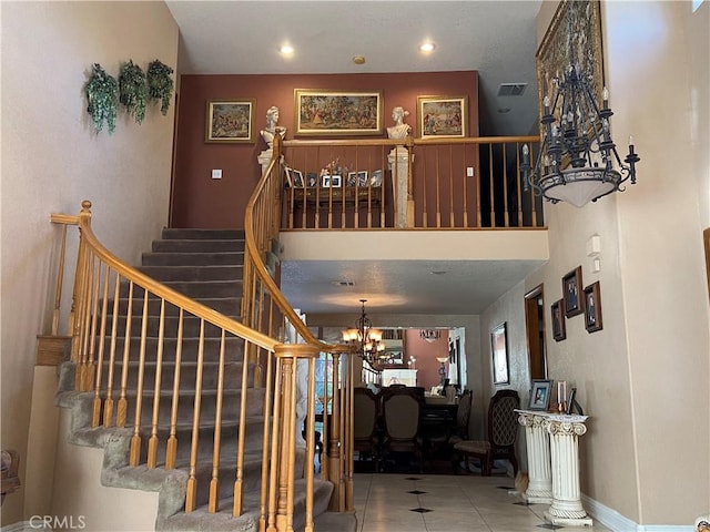 7614 Calpella Ave, Hesperia, CA 92345 - stairs featuring a chandelier and tile patterned flooring