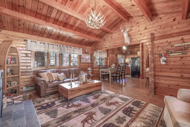 331 Maple Ln, Sugarloaf, CA 92386 - living area featuring wood ceiling, a chandelier, wood finished floors, and wooden walls
