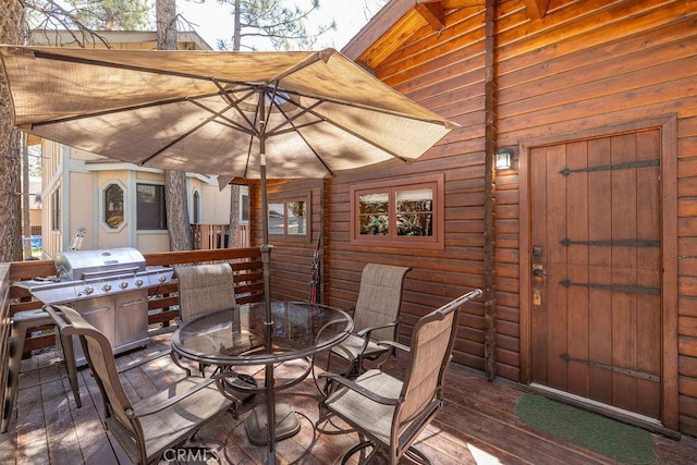331 Maple Ln, Sugarloaf, CA 92386 - wooden terrace with outdoor dining area and area for grilling