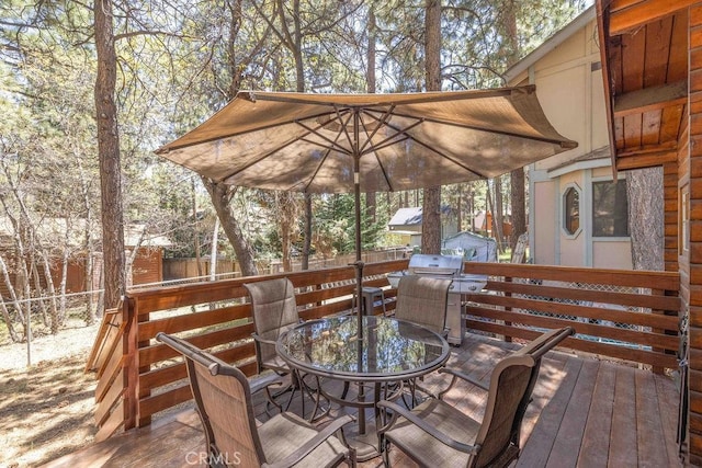 331 Maple Ln, Sugarloaf, CA 92386 - deck with outdoor dining area, a fenced backyard, and area for grilling