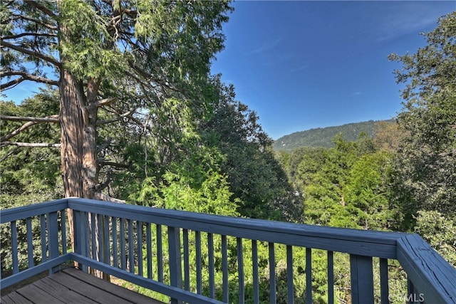 197 Weisshorn Dr, Crestline, CA 92325 - wooden terrace with a forest view