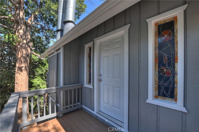 197 Weisshorn Dr, Crestline, CA 92325 - doorway to property featuring board and batten siding