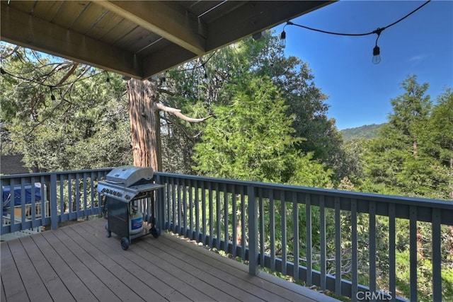 197 Weisshorn Dr, Crestline, CA 92325 - wooden deck featuring a grill
