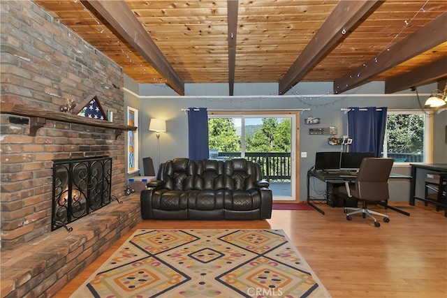 197 Weisshorn Dr, Crestline, CA 92325 - living area featuring wood finished floors, a brick fireplace, an office area, and wood ceiling with exposed beams