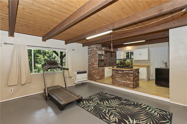 197 Weisshorn Dr, Crestline, CA 92325 - workout room with heating unit, wood ceiling, and baseboards