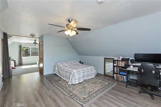 197 Weisshorn Dr, Crestline, CA 92325 - bedroom with wood finished floors, an office area, lofted ceiling, and ceiling fan
