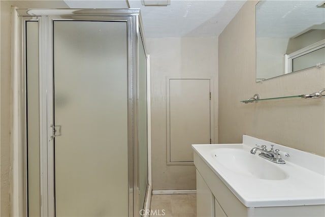 197 Weisshorn Dr, Crestline, CA 92325 - bathroom featuring a shower stall, vanity, and tile patterned floors
