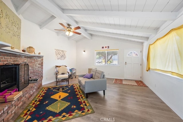 508 Woodland Dr, Los Osos, CA 93402 - living room with wood finished floors, a ceiling fan, wood ceiling, a brick fireplace, and baseboards