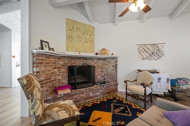 508 Woodland Dr, Los Osos, CA 93402 - living area with wood finished floors, ceiling fan, and a brick fireplace