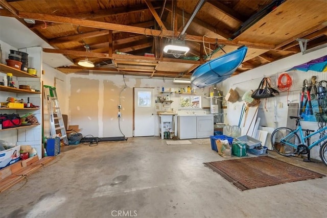 508 Woodland Dr, Los Osos, CA 93402 - garage featuring separate washer and dryer and a garage door opener