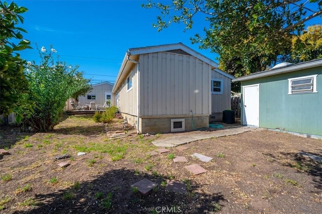 508 Woodland Dr, Los Osos, CA 93402 - rear view of house featuring board and batten siding