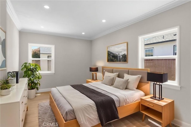 208 W Caldwell St, Compton, CA 90220 - bedroom with ornamental molding, multiple windows, light wood-style floors, and recessed lighting