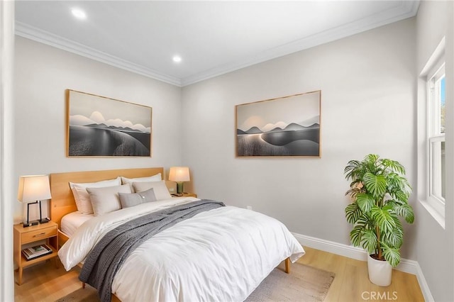 208 W Caldwell St, Compton, CA 90220 - bedroom with wood finished floors, crown molding, baseboards, and recessed lighting