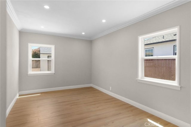 208 W Caldwell St, Compton, CA 90220 - empty room featuring crown molding, baseboards, light wood-type flooring, and recessed lighting